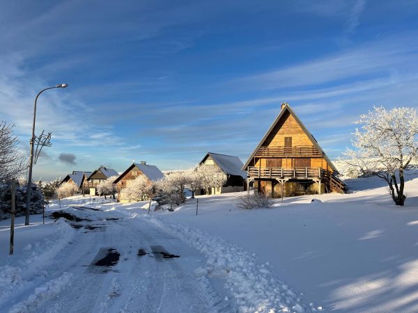 Chalets under the snow in Chastreix-Sancy